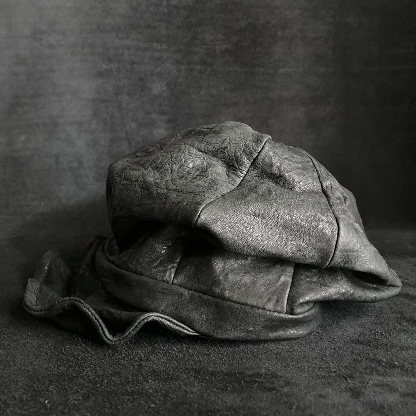 Wrinkled soft black leather casquette