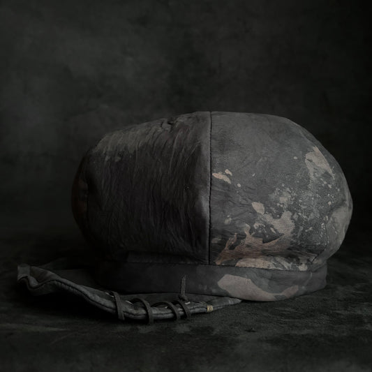 Grim partial discoloration casquette
