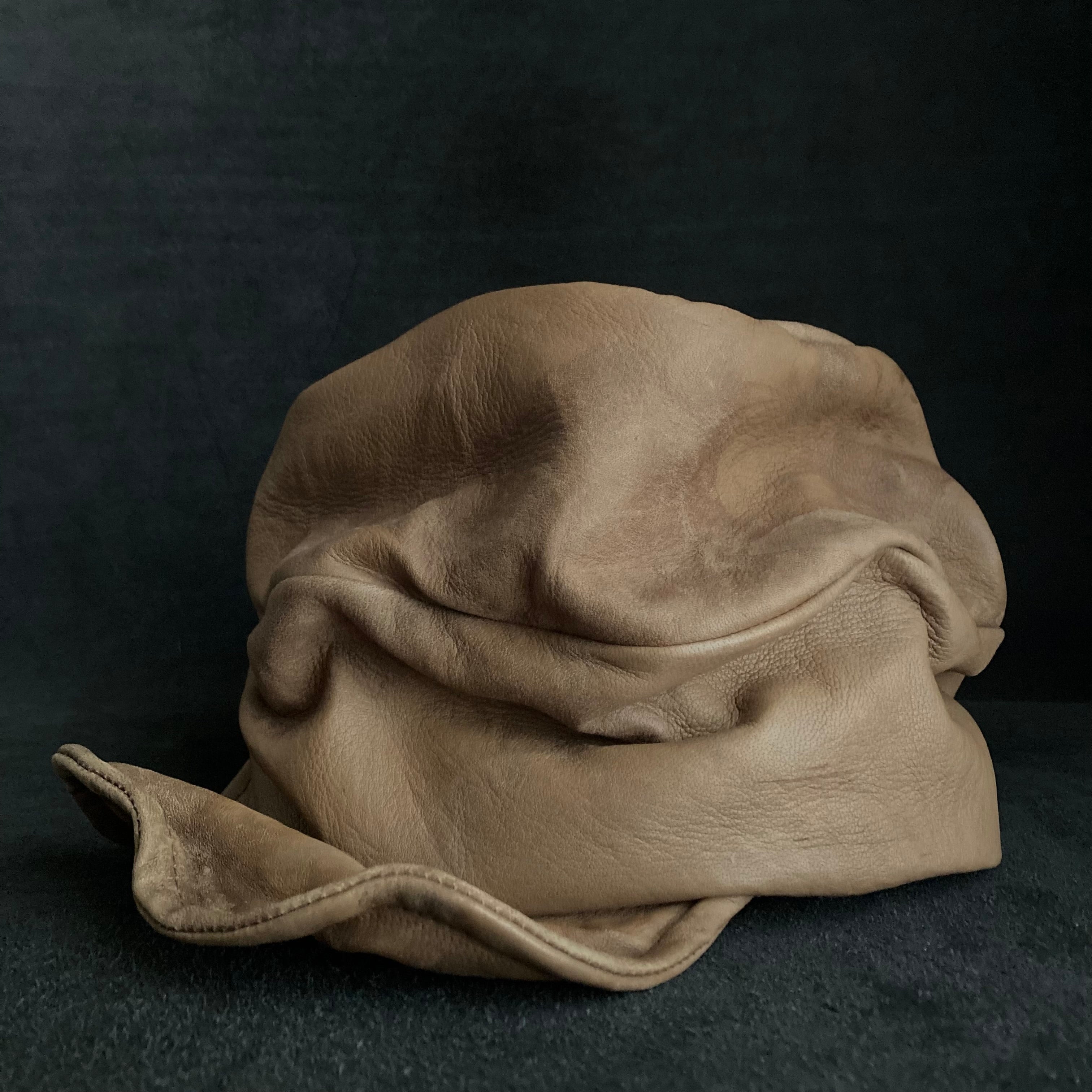 Irregularly dyed light brown leather turn cap – triangles hat