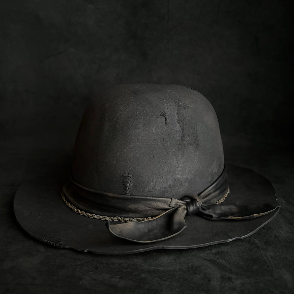 Charcoal rusty chain dark bowler hat