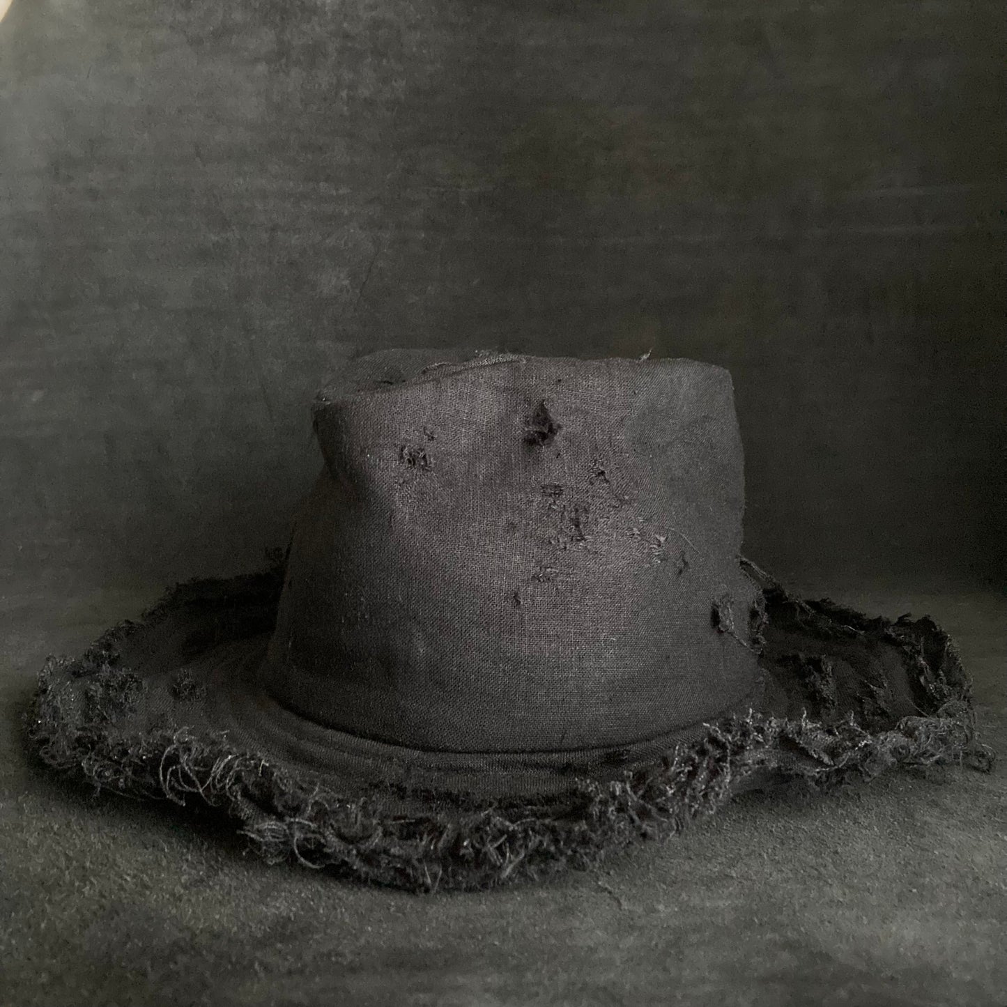 Black linen damage  fedora hat