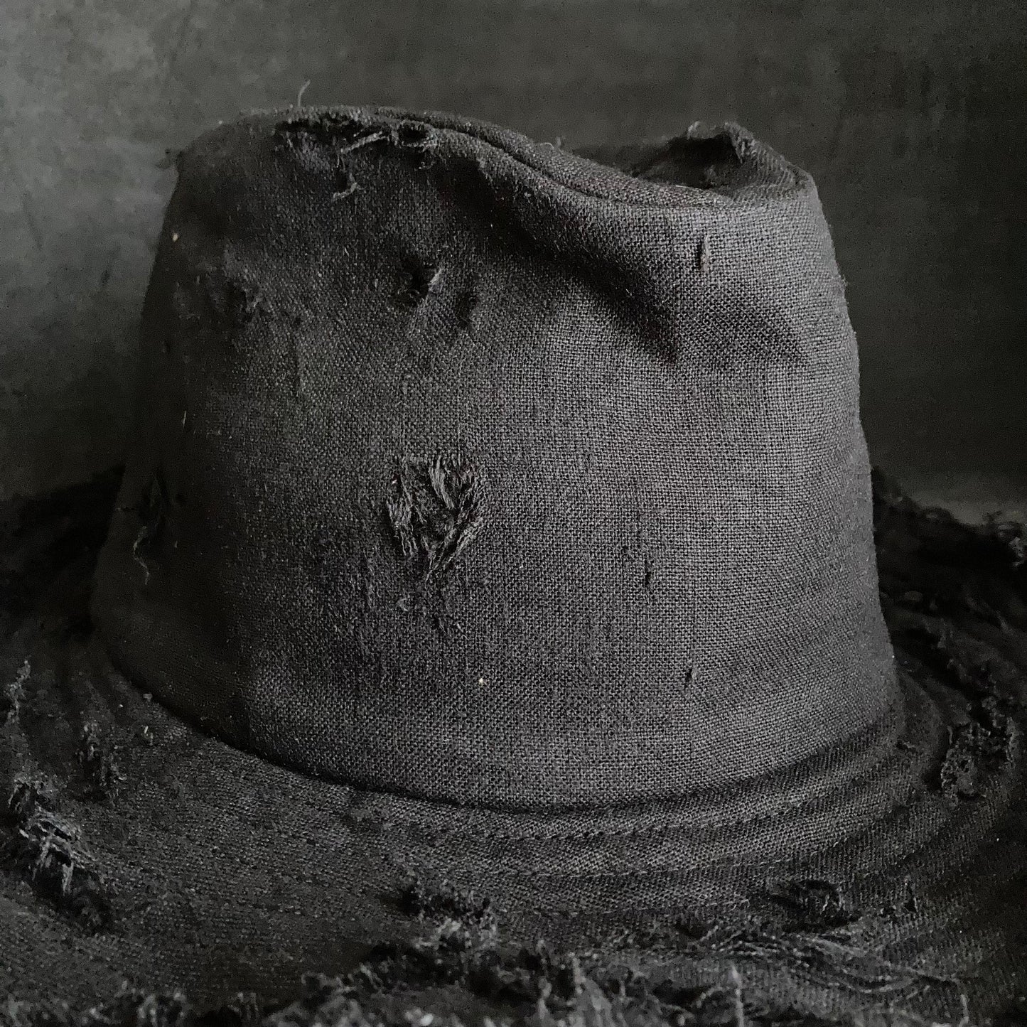 Black linen damage  fedora hat