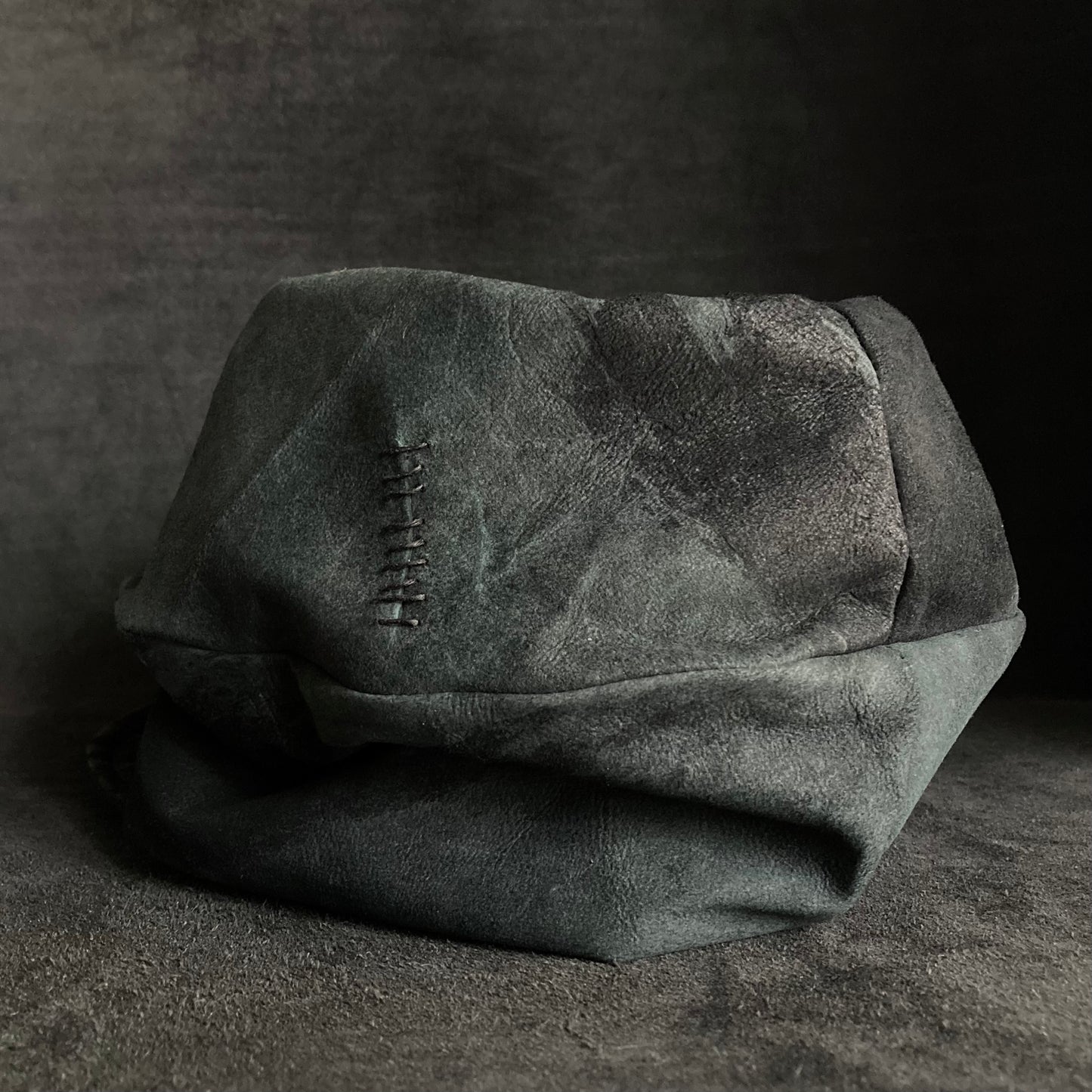 Lake leather stitch turn cap