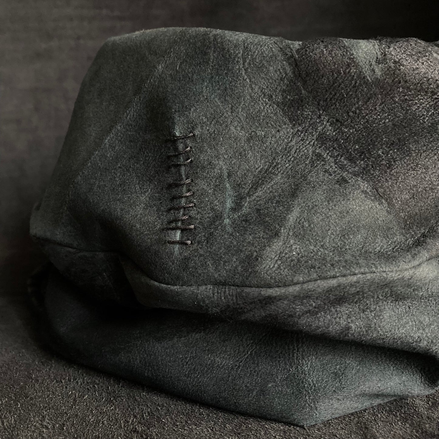 Lake leather stitch turn cap