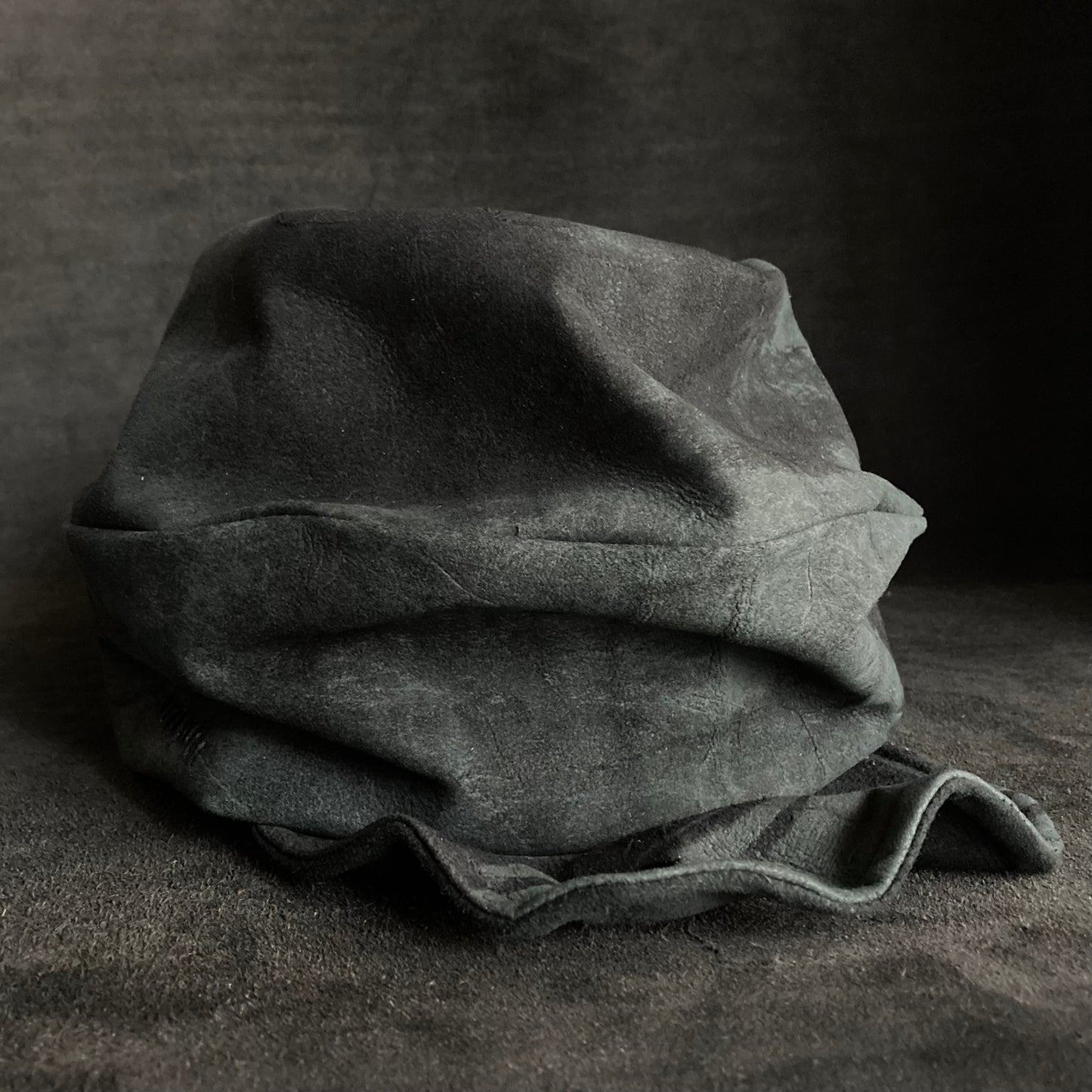 Lake leather stitch turn cap