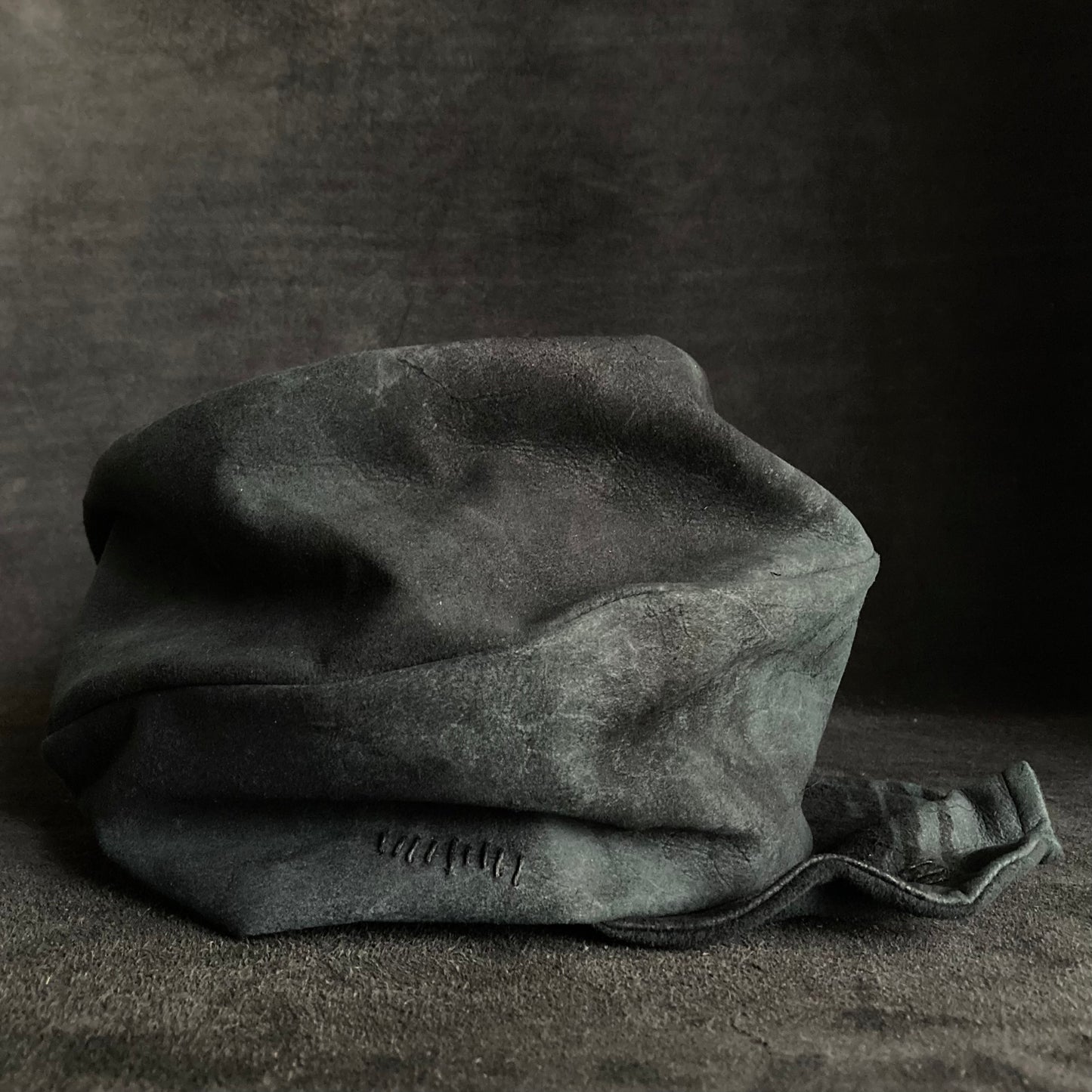 Lake leather stitch turn cap