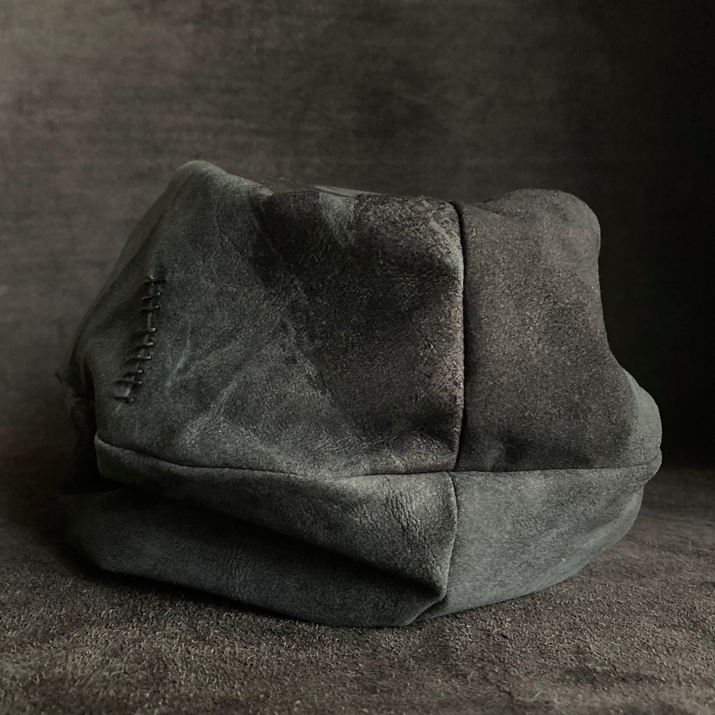 Lake leather stitch turn cap