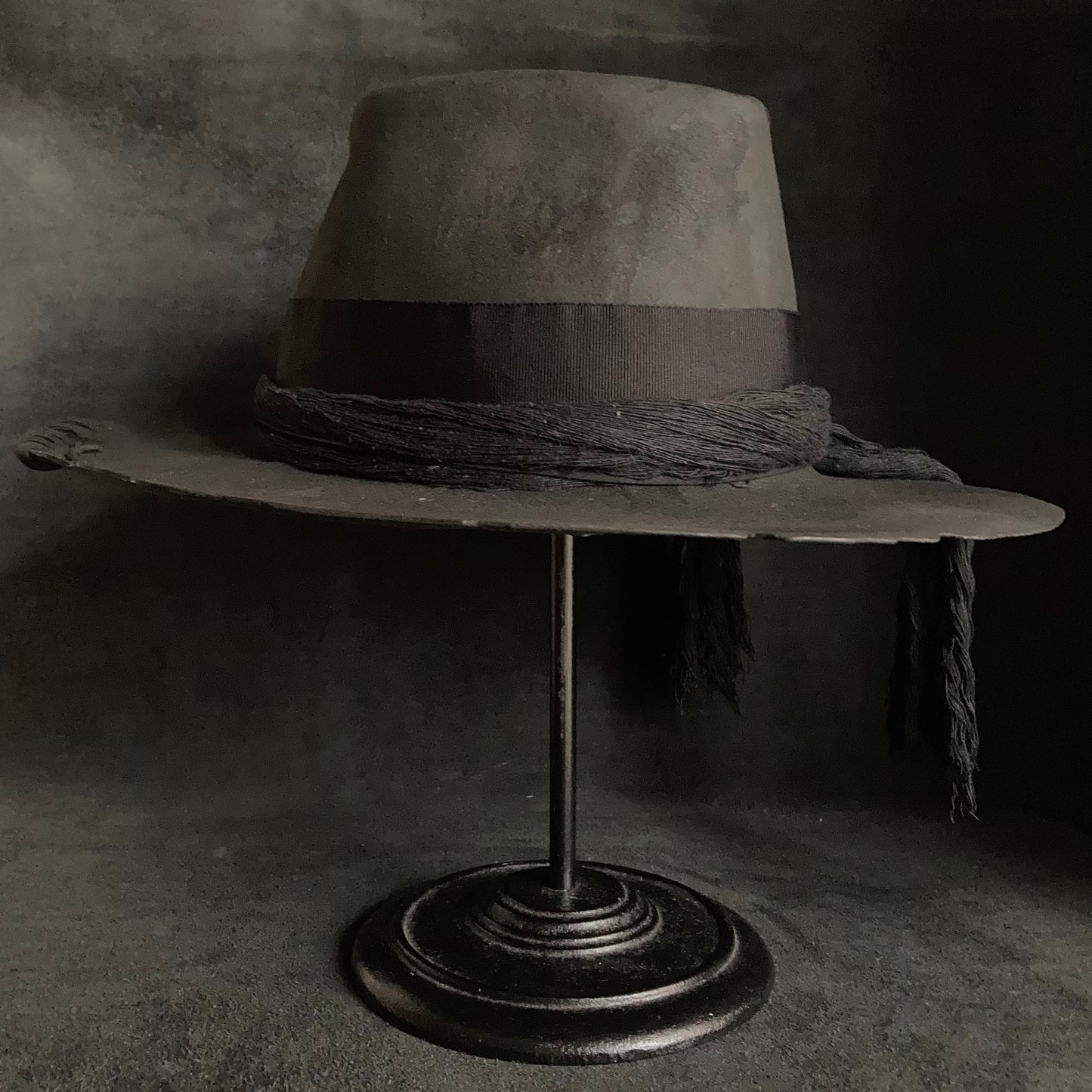 Charcoal cord around diamond hat