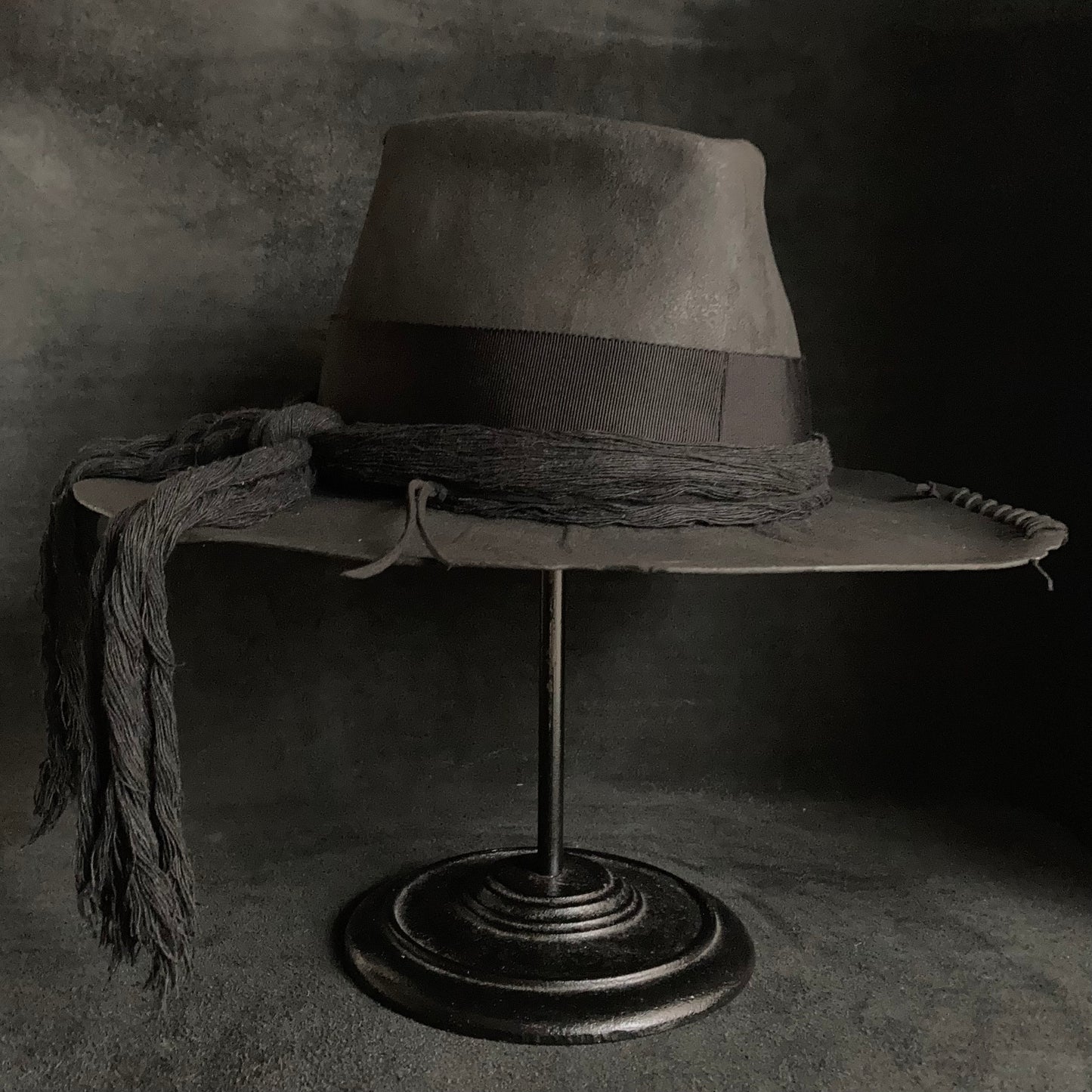 Charcoal cord around diamond hat