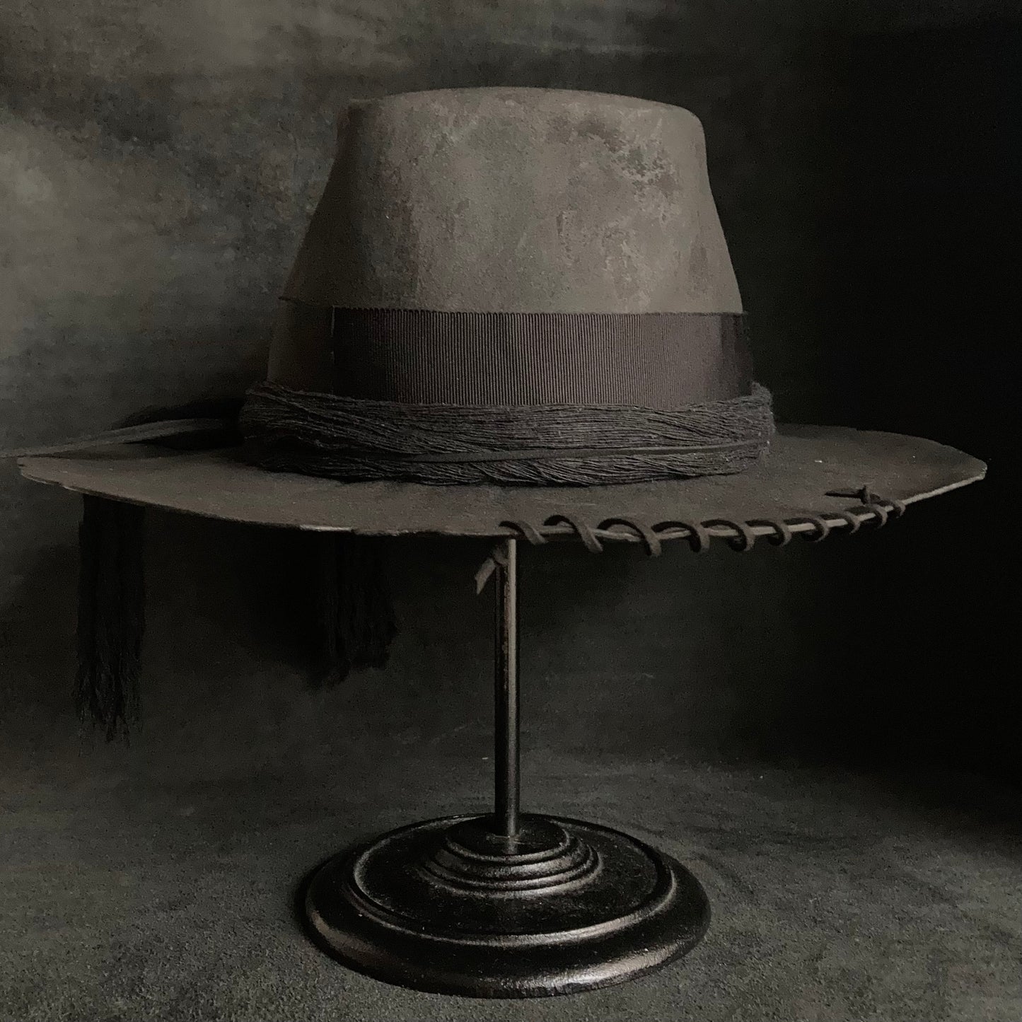 Charcoal cord around diamond hat