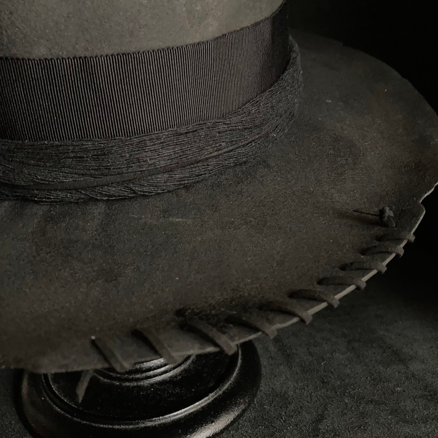 Charcoal cord around diamond hat