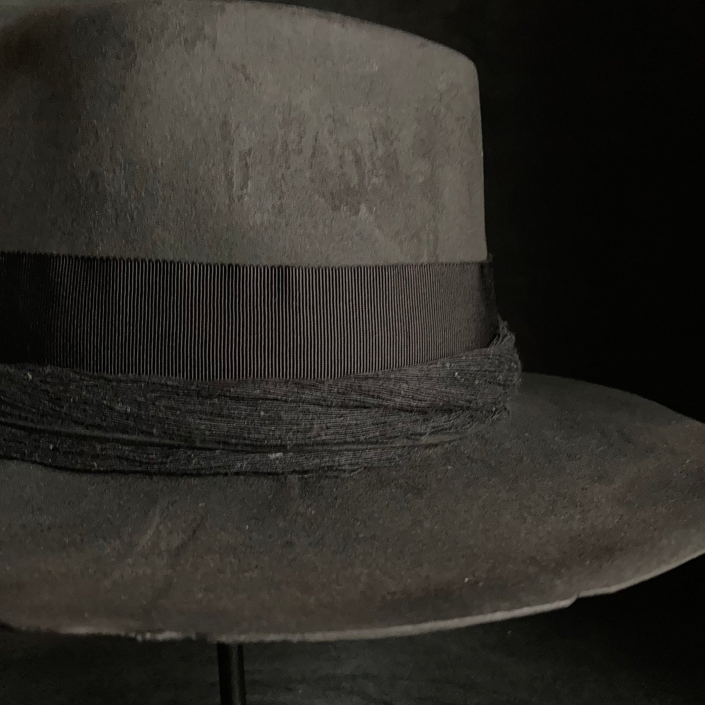 Charcoal cord around diamond hat