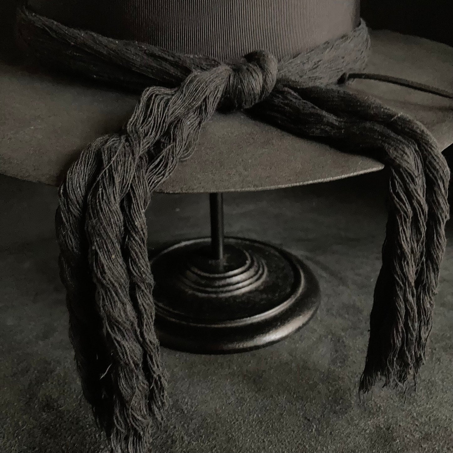 Charcoal cord around diamond hat