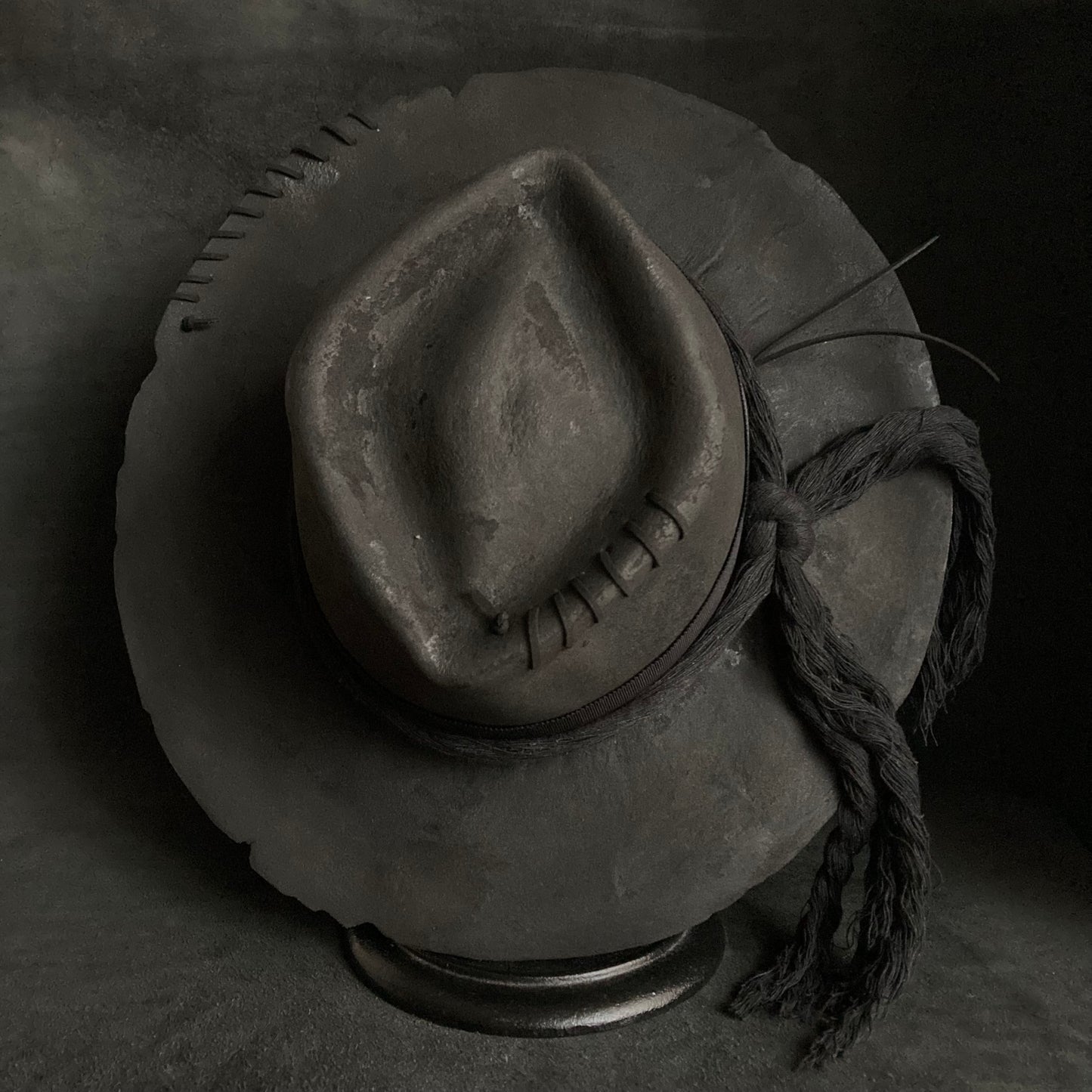 Charcoal cord around diamond hat