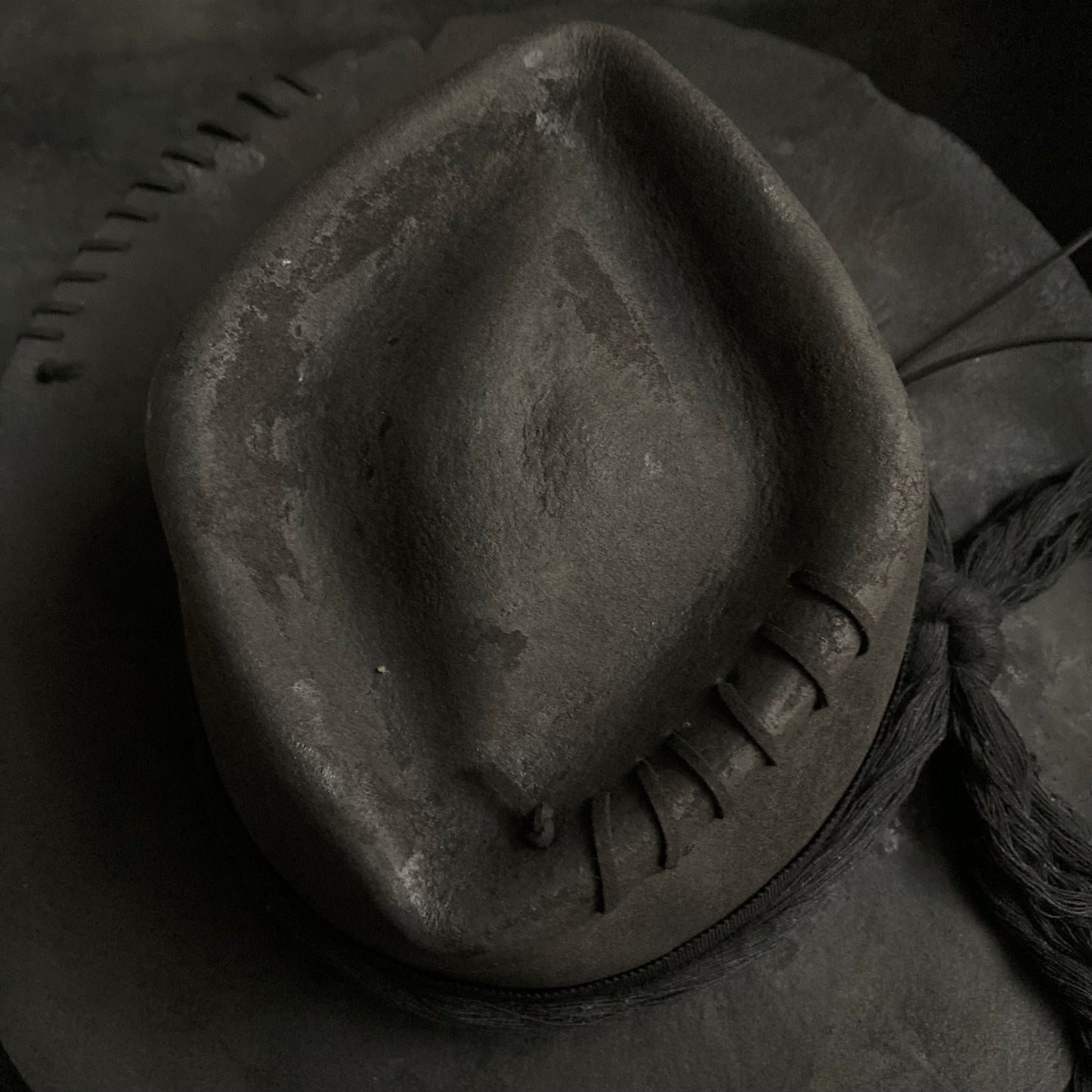 Charcoal cord around diamond hat