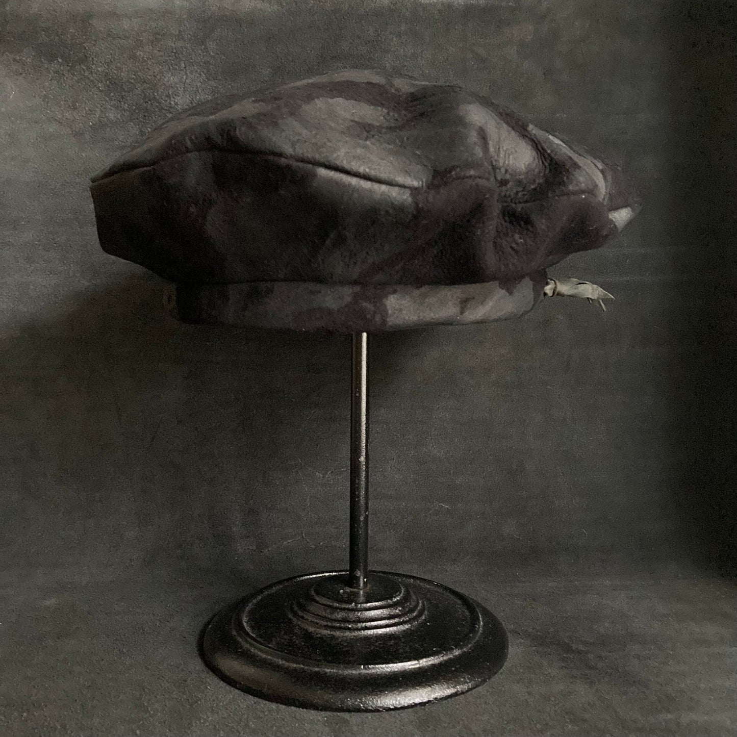 Bleached black leather beret