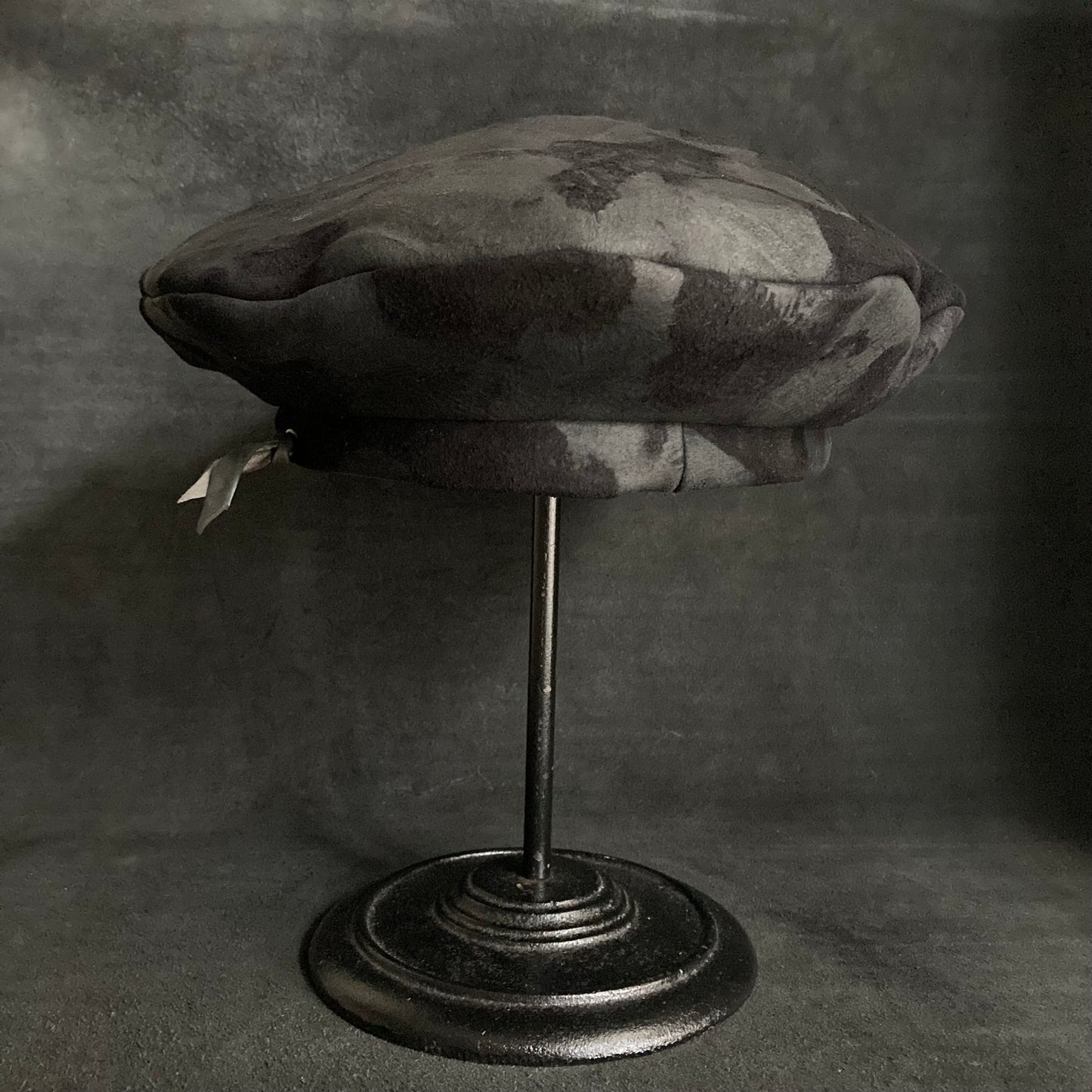 Bleached black leather beret