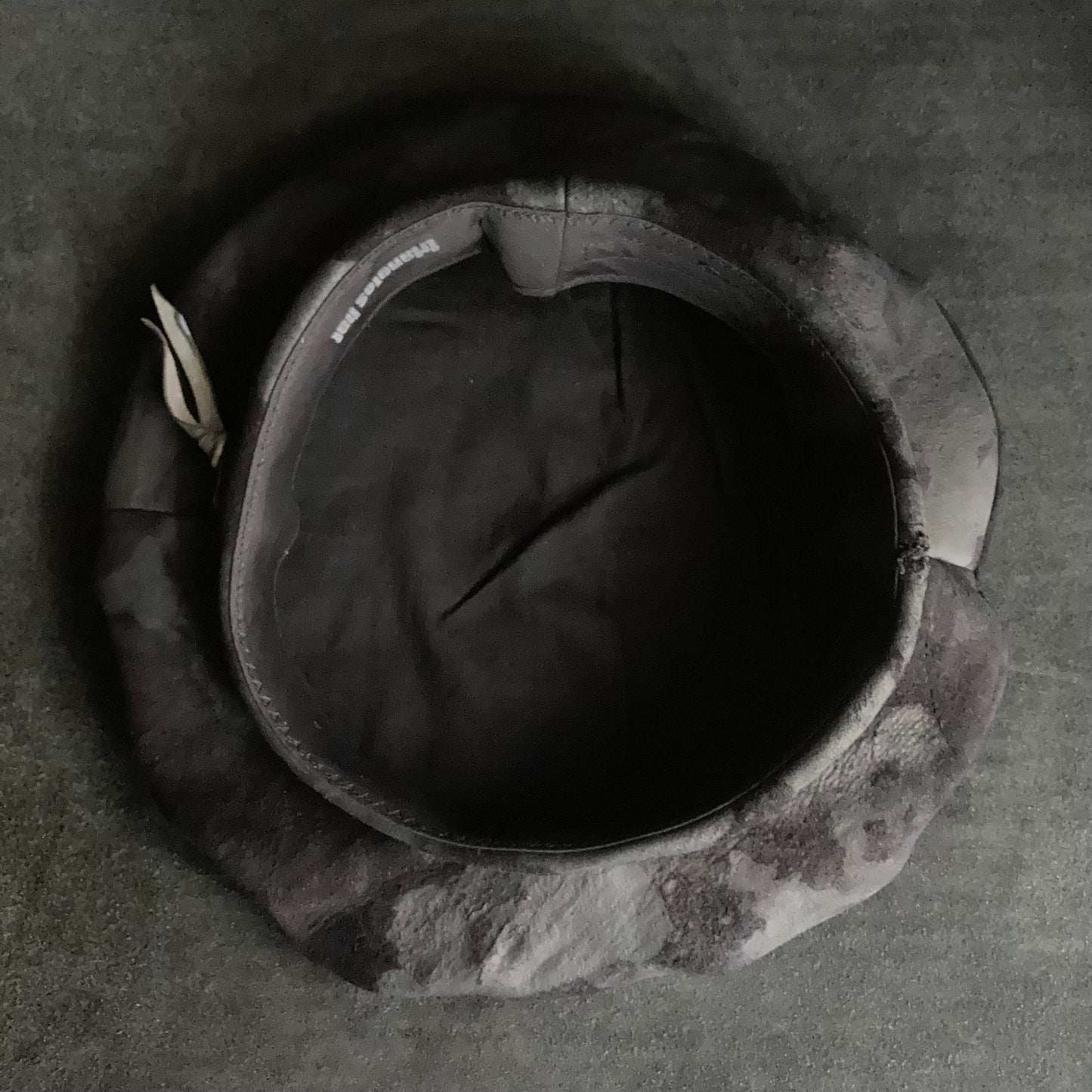 Bleached black leather beret