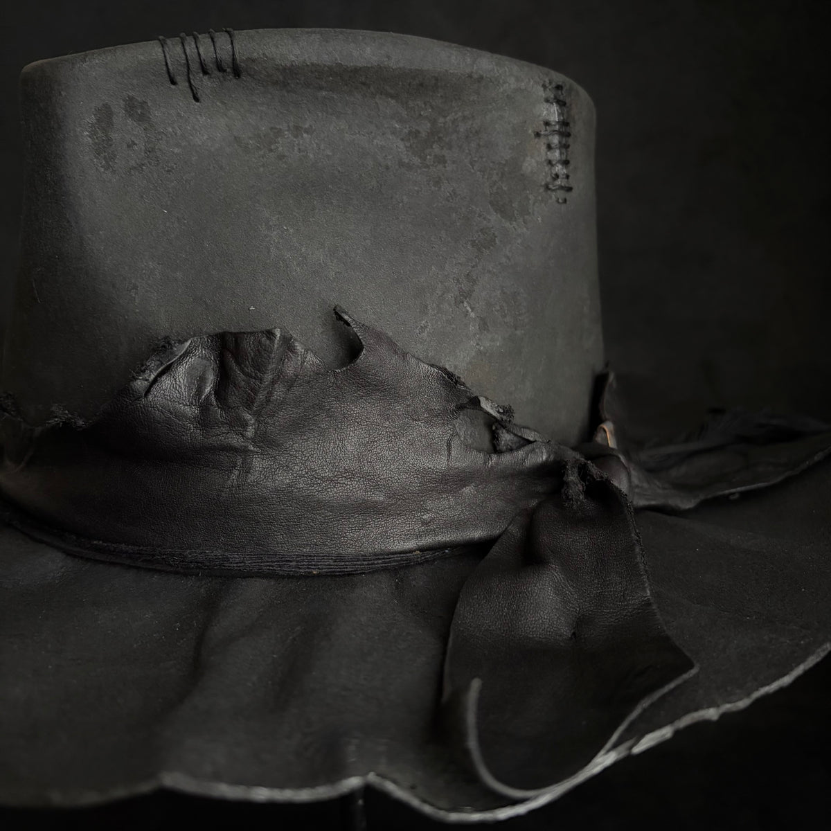 Charcoal rusty decaying fedora hat