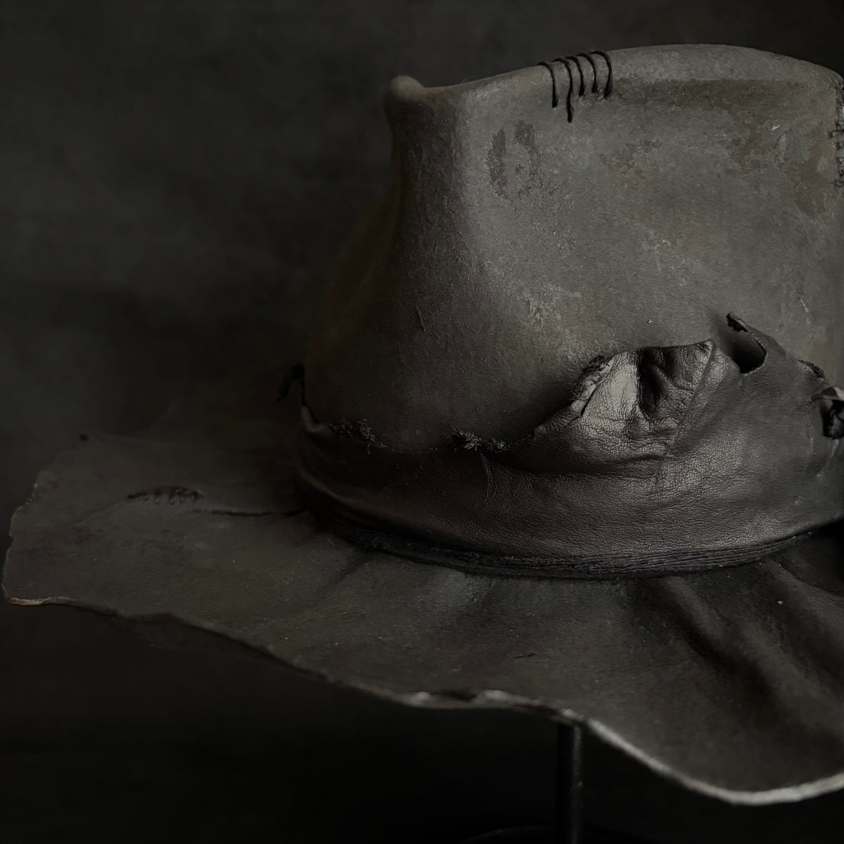 Charcoal rusty decaying fedora hat