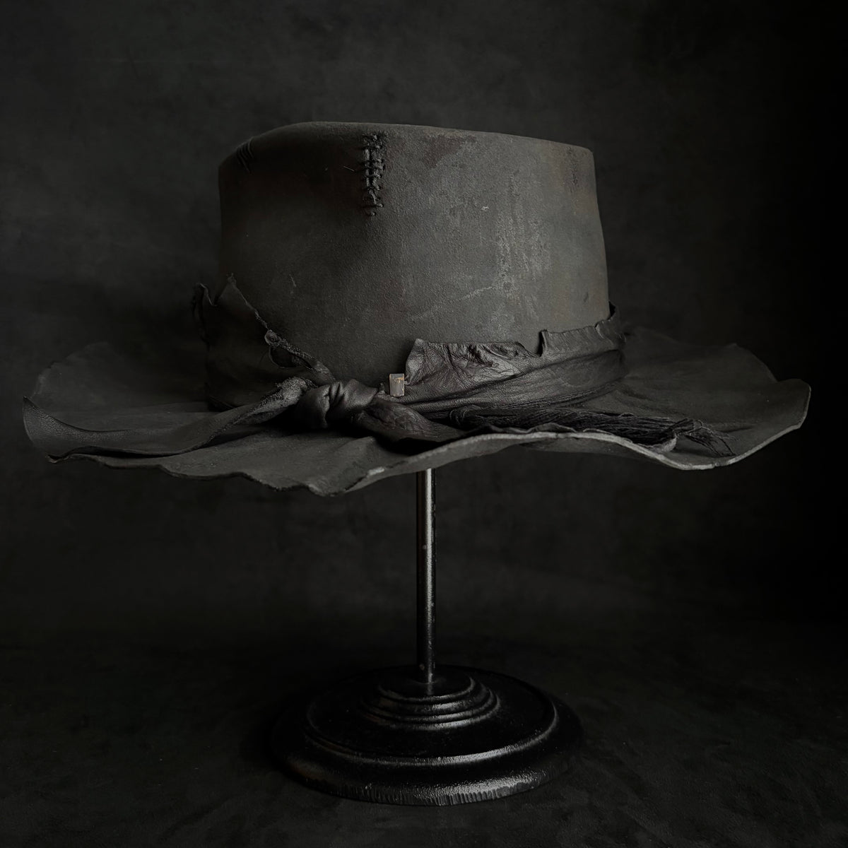 Charcoal rusty decaying fedora hat
