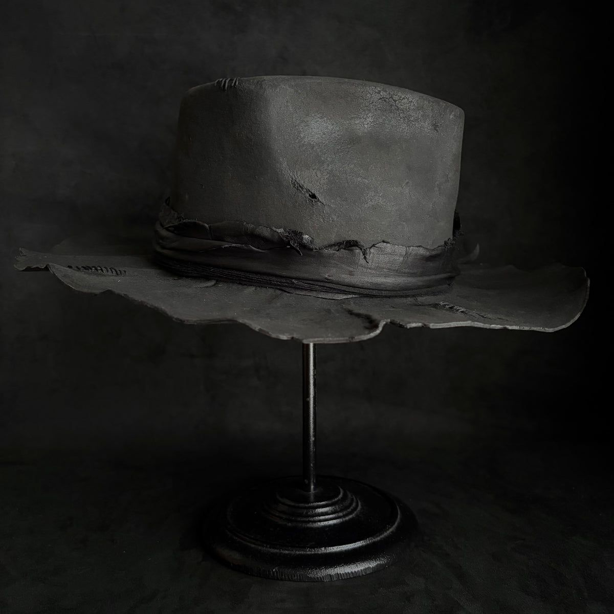 Charcoal rusty decaying fedora hat