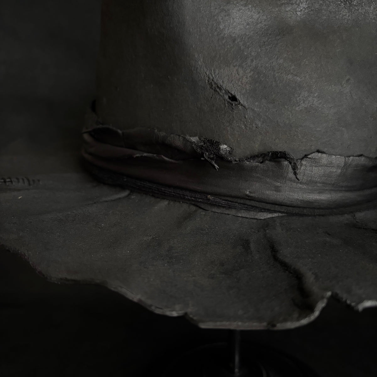 Charcoal rusty decaying fedora hat