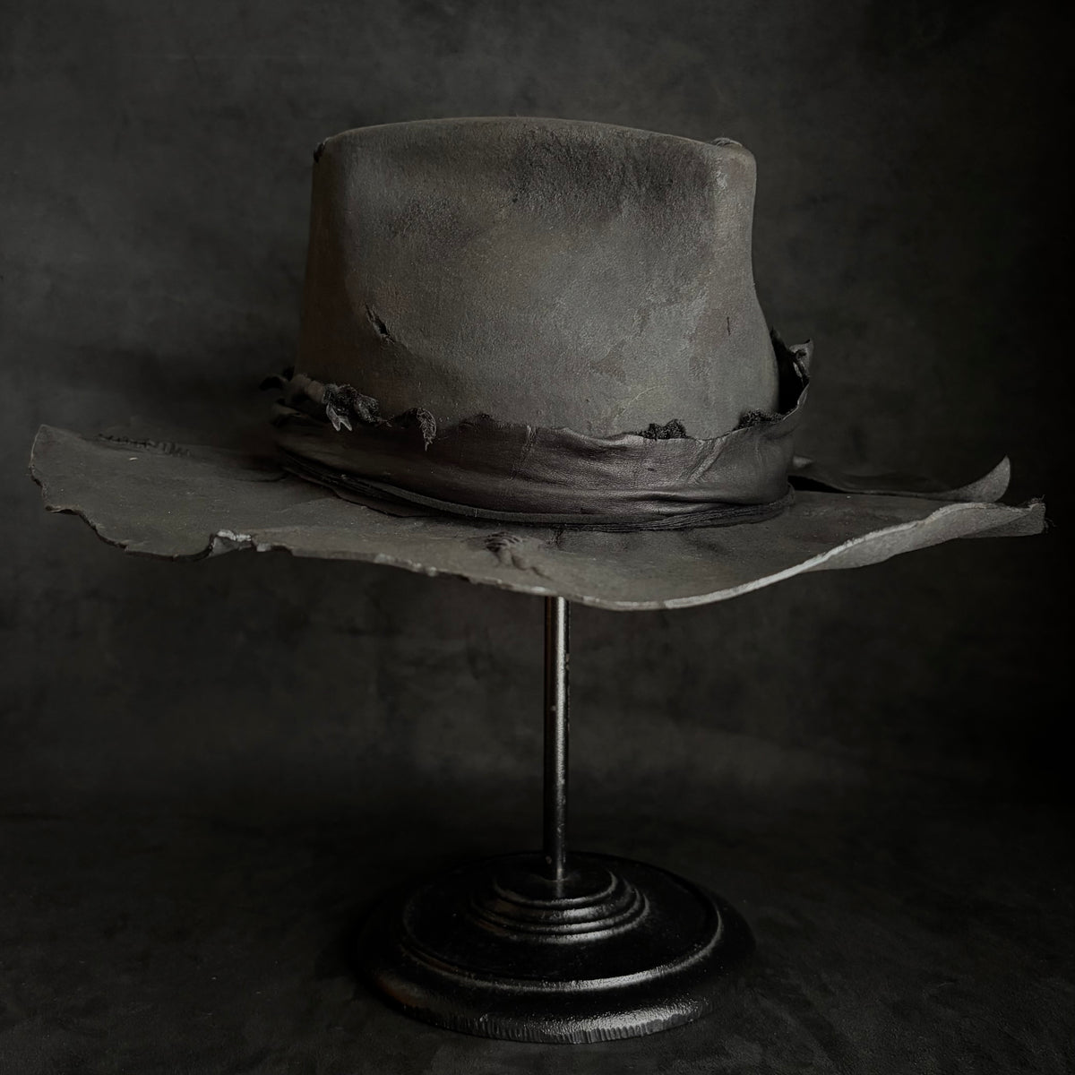 Charcoal rusty decaying fedora hat