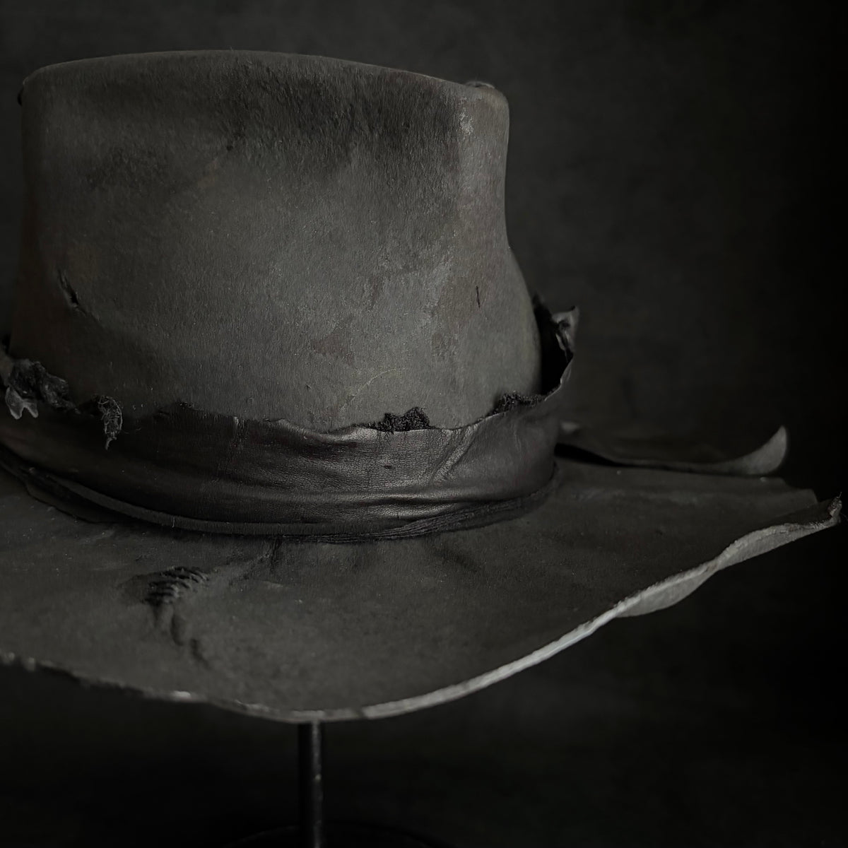 Charcoal rusty decaying fedora hat