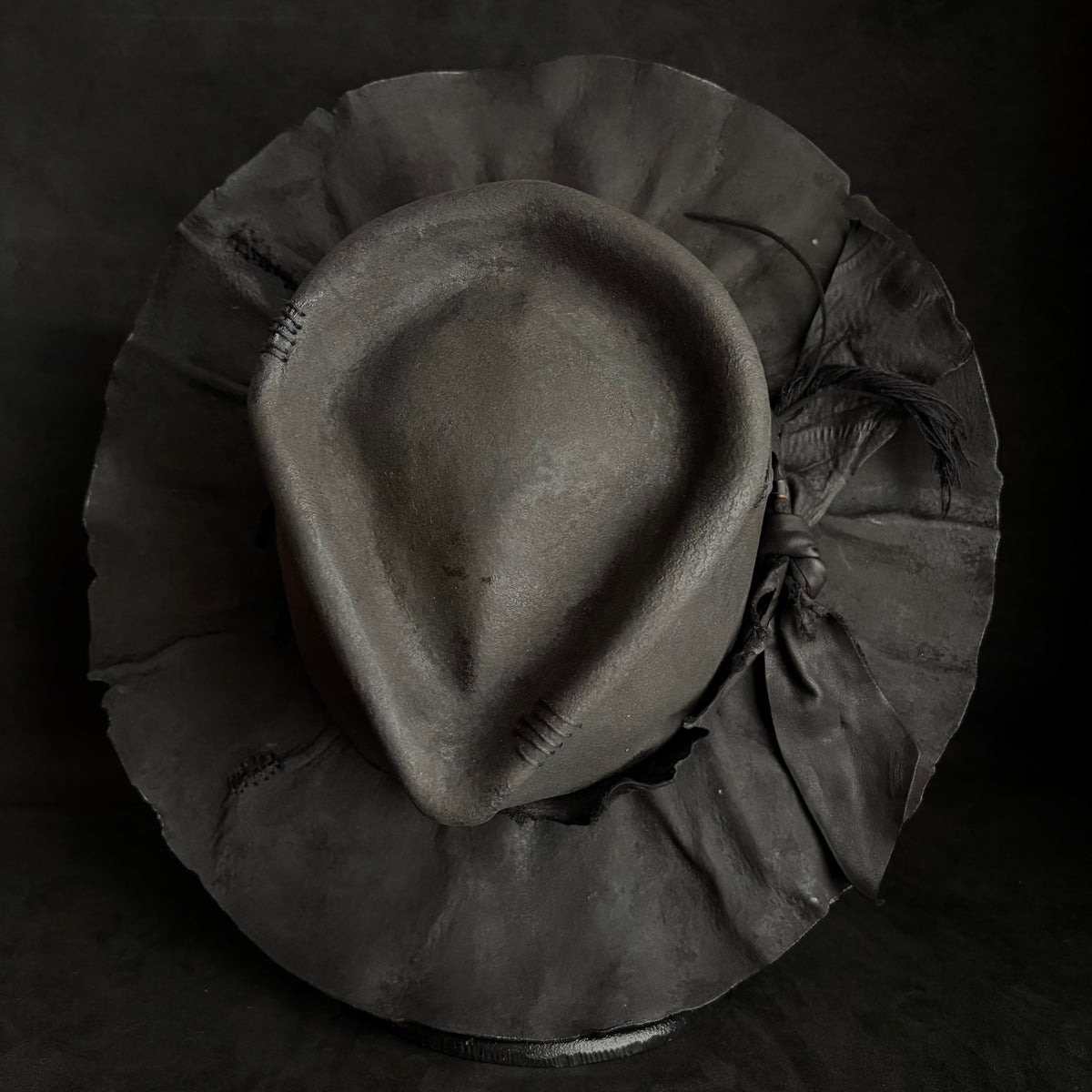 Charcoal rusty decaying fedora hat