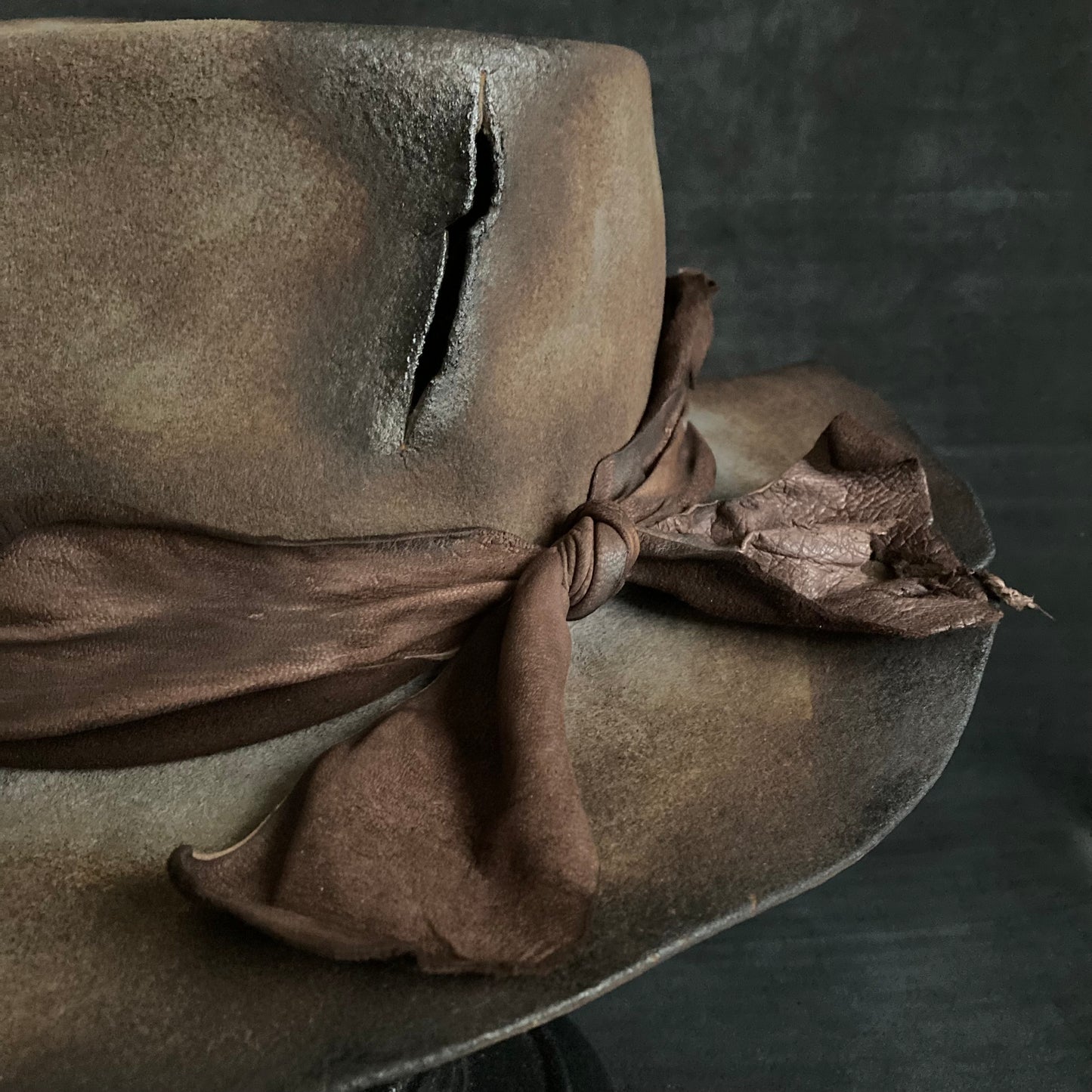 Torn scar fedora hat