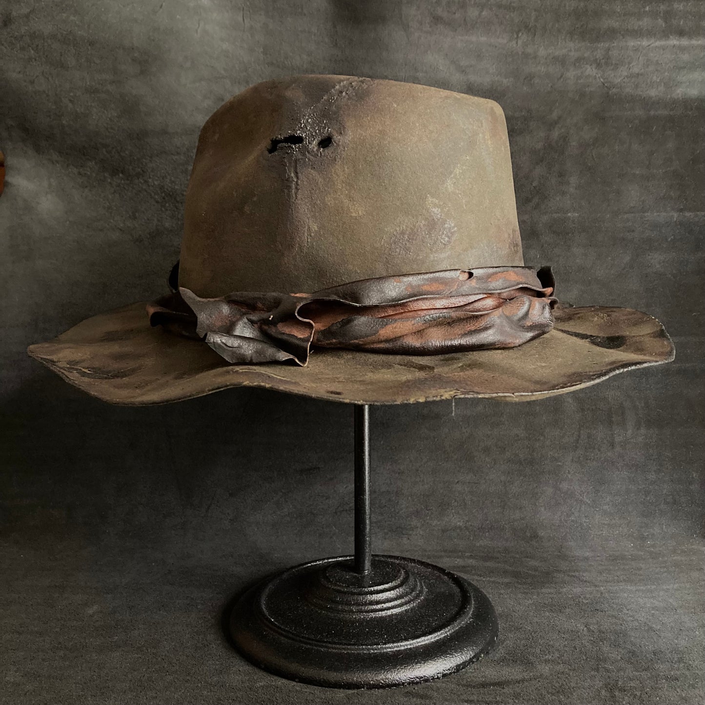Hard burnt leather fedora hat
